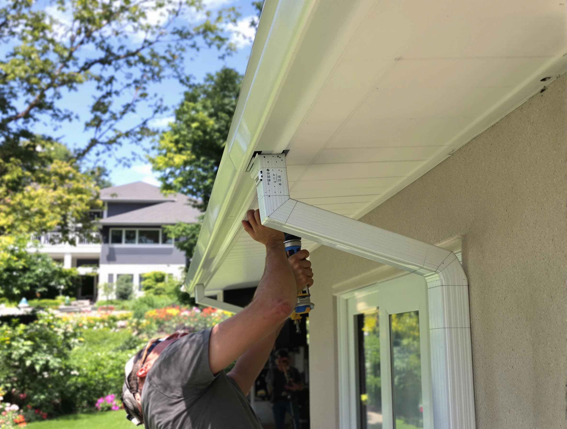 North Ridgeville Roofing Company technicians performing gutter installation in North Ridgeville, OH